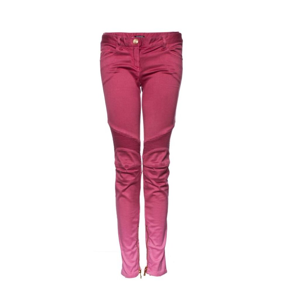 Balmain pink biker jeans with color gradient.